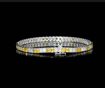 18K White Gold Tennis Bracelet With 8.71 TCW - Natural Fancy Colored Diamond Main Stone