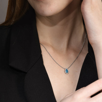 0.58 tcw Pear Shape Fancy Intense Blue in 14k Halo Pendant