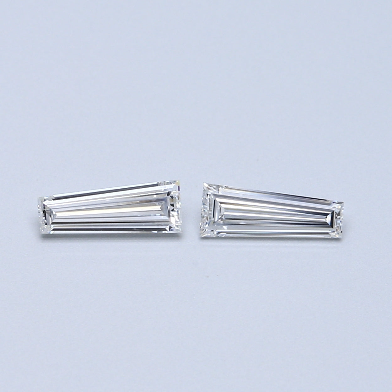 0.69 TCW Pair of Tapered Baguette Natural Loose Diamond