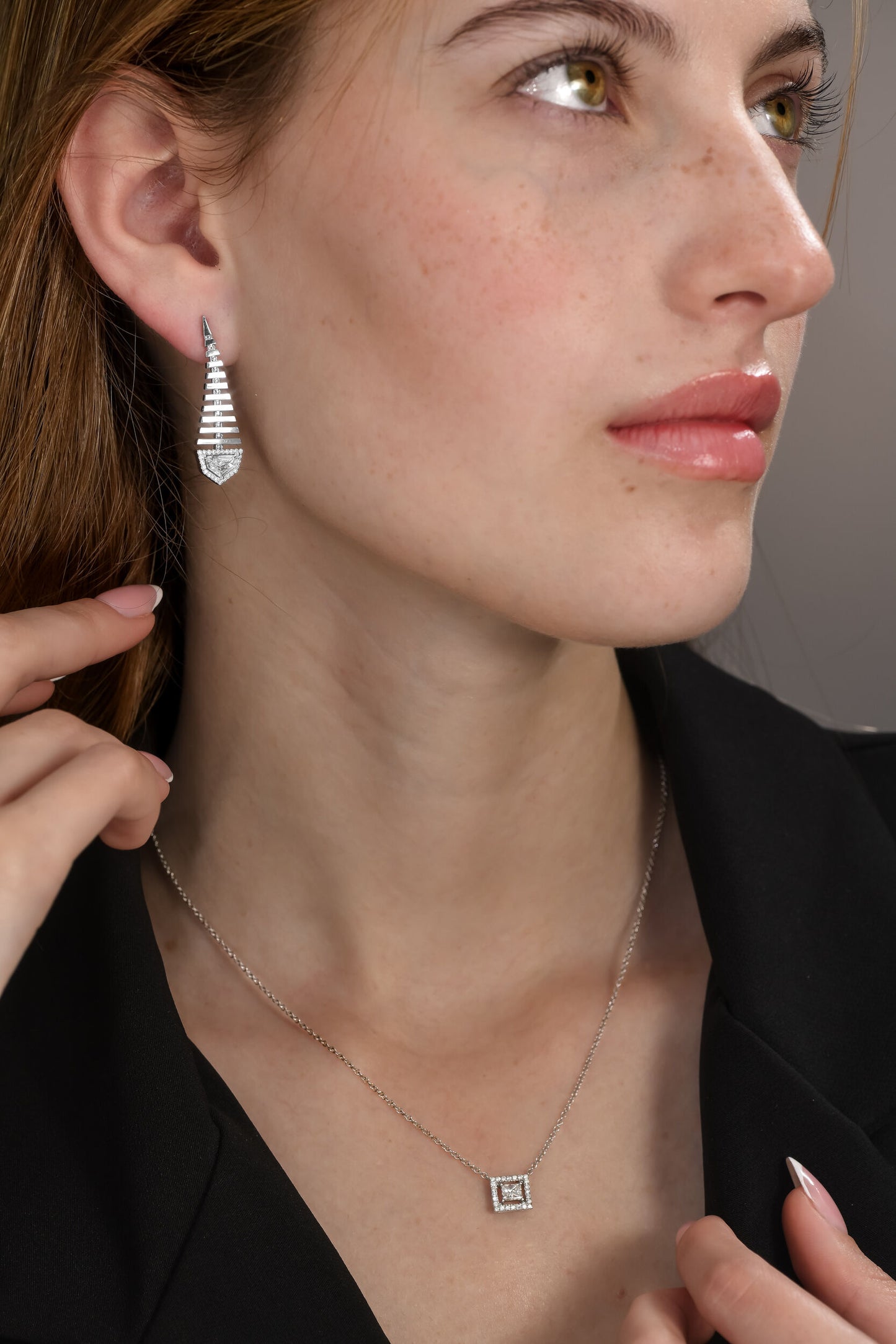 1.06 tcw Epaulette Shape Natural Diamond in a 18k White Gold Dangling Earring, Main Stones 0.89ct (Epaulette Shape) +0.17ct Round Stones, Gold Weight: 6.49 Gram